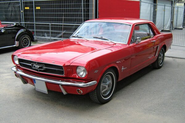 Red 1965 Ford Mustang front view