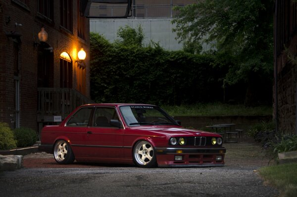 A picture of a classic red bmw car