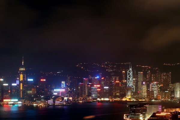 Neon night lights of Hong Kong skyscrapers