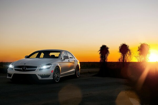 Beautiful car on the background of sunset