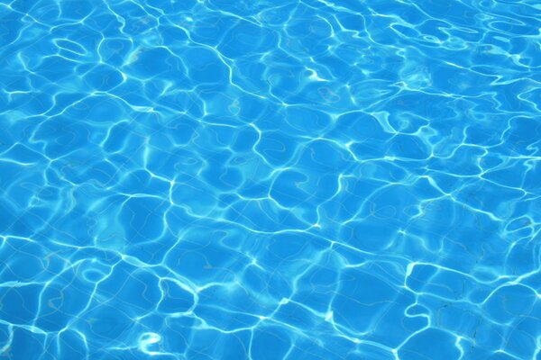 Blue background of pool water