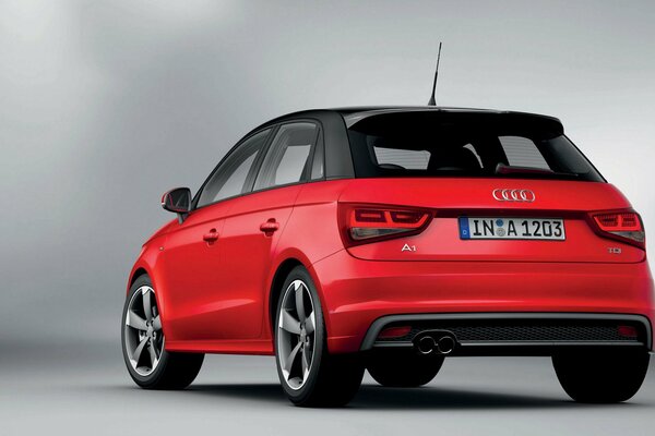 Voiture rouge audi A1 pour femme