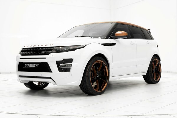 Range rover blanc avec Jantes noires