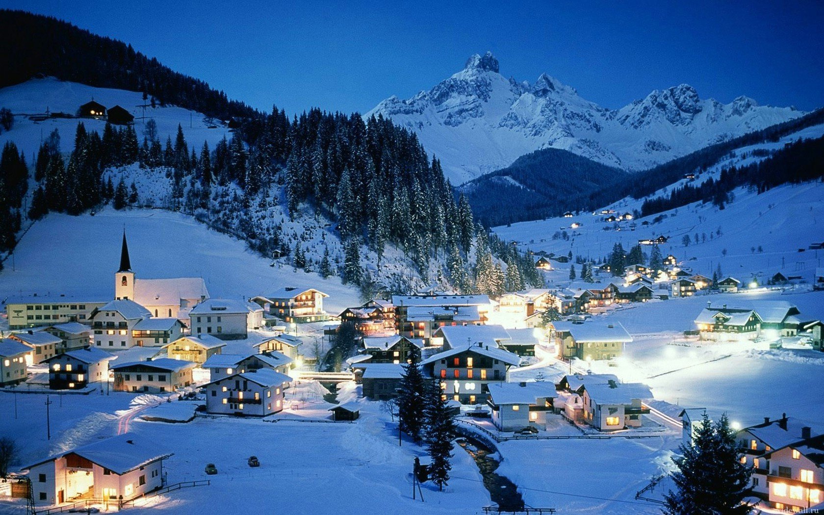 montagna città inverno notte luci neve luci della città