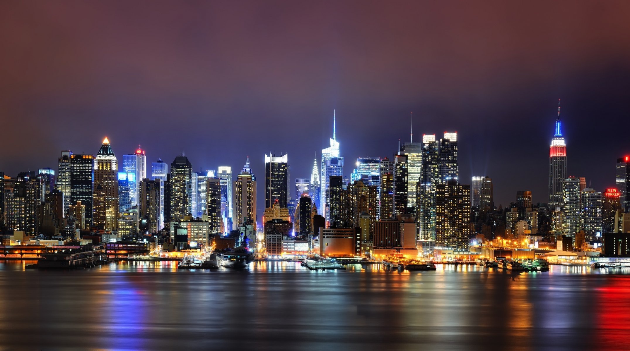 new york city manhattan états-unis new york gratte-ciel maisons bâtiments rivière réflexion lumières nuit soir coucher de soleil ville ciel promenade quai océan ciel nocturne lumières de la ville