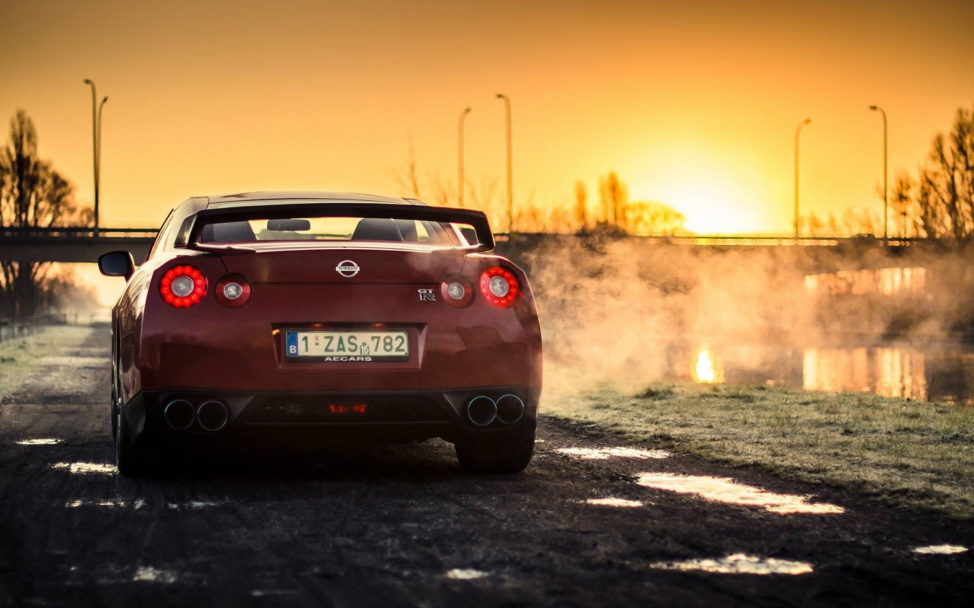 nissan r35 gt-r czerwony sport samochód słońce zachód słońca tył tył