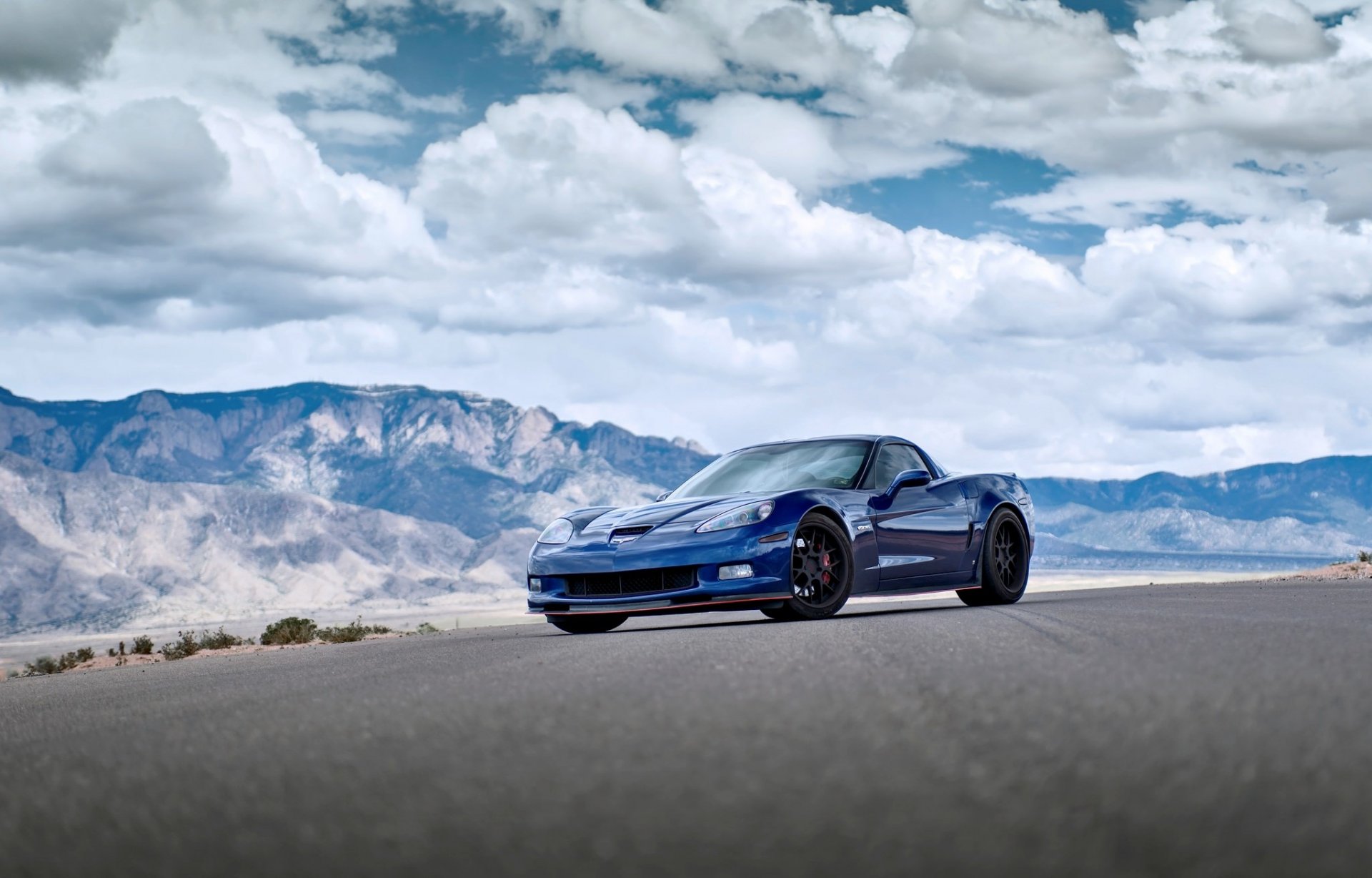 chevrolet corvette z06 blue chevrolet corvette mountains sky cloud