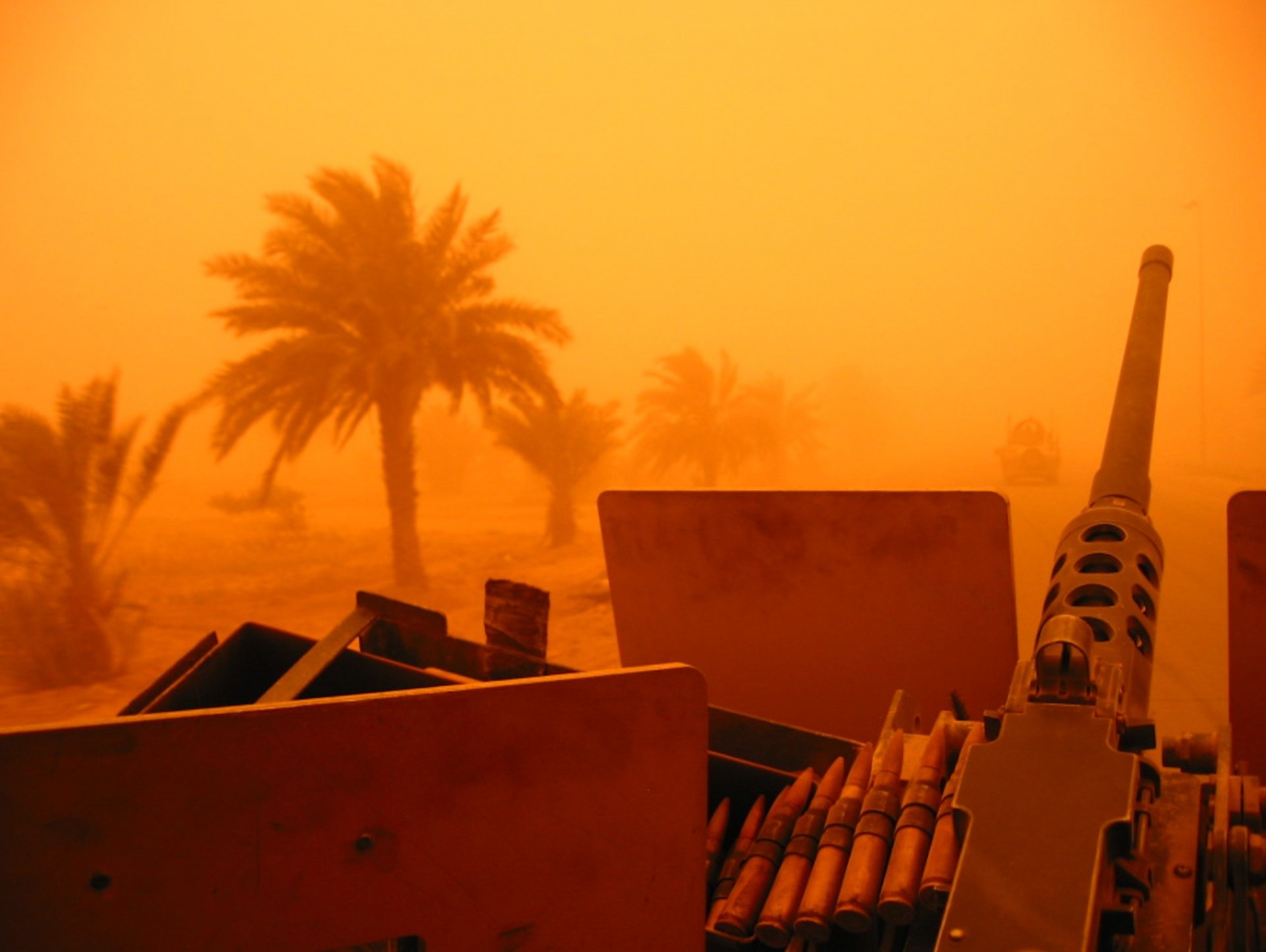 machine gun sand storm palm trees m2 browning iraq war military equipment