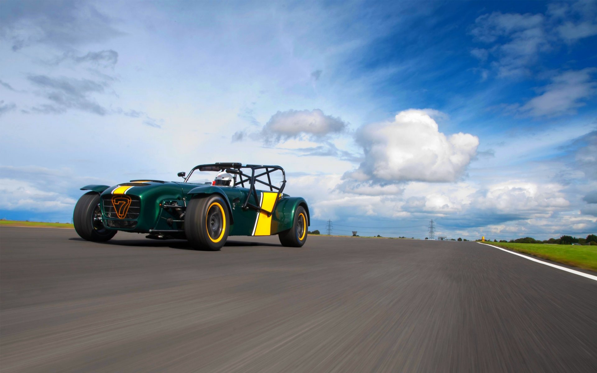 caterham r600 superlight front sky clouds road