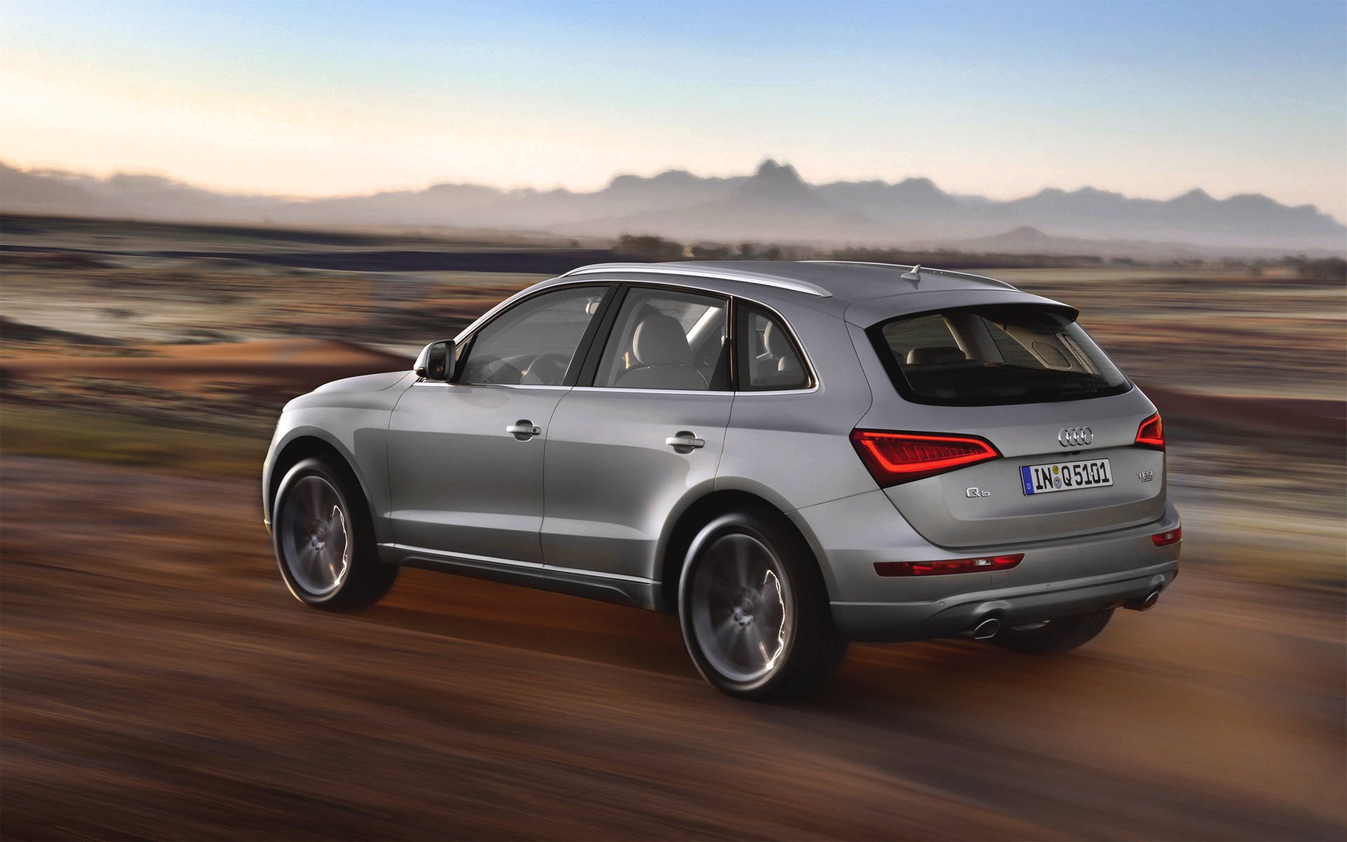 audi q5 car in motion a side view silver grey machine suv