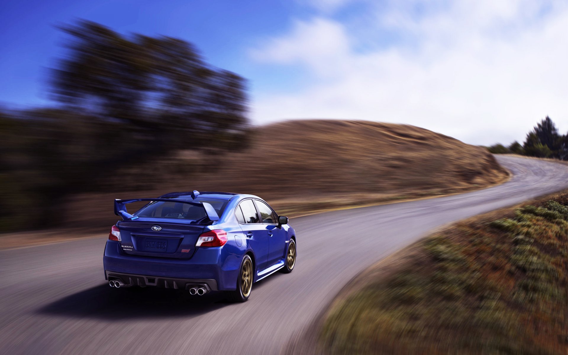 ubaru wrx sti auto coche azul vista trasera carretera día subaru en movimiento