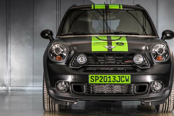 Black Mini Cooper with green stripes