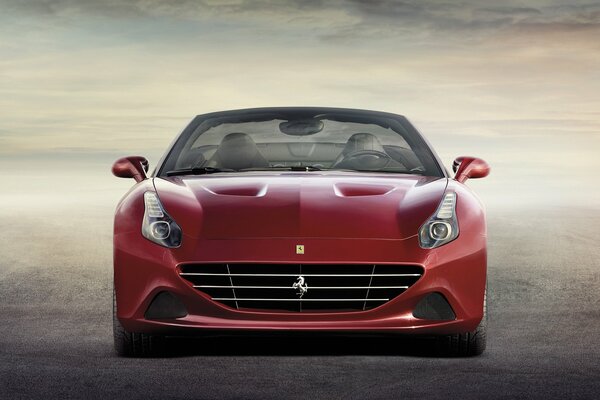 Image of a red Ferrari and clouds