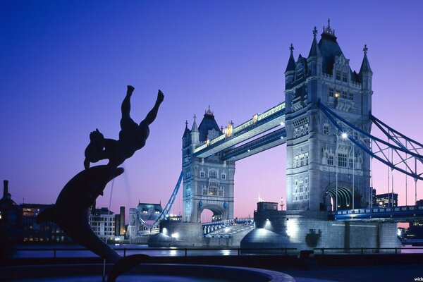 The lights of London at night over the bridge