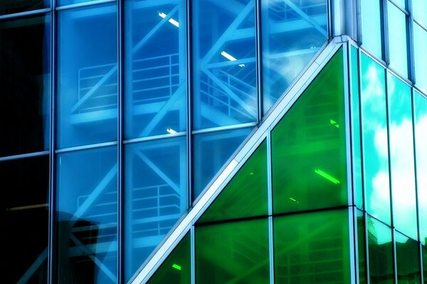 Glass building with blue and green colors