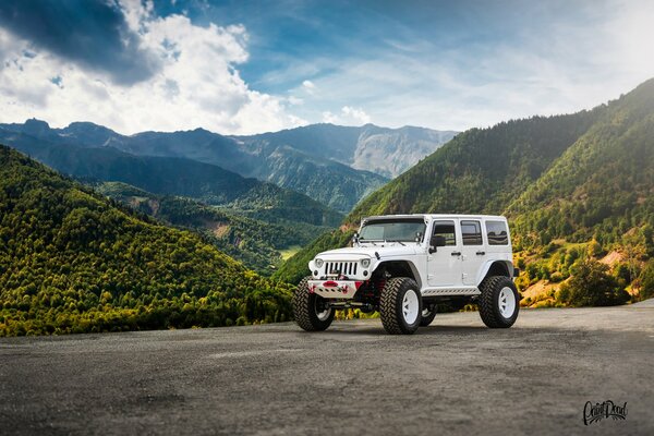 Off-road vehicle with a beautiful mountain landscape