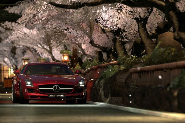 Beautiful modern car on the night roads of the city