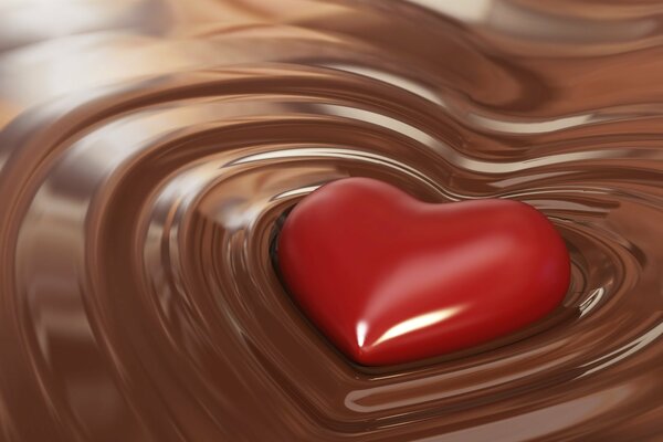 Rotes Herz schwimmt in flüssiger Schokolade