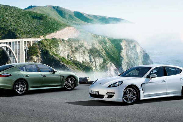 White Porsche on the background of magnificent mountains