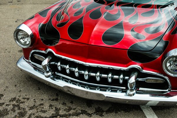 Classic retro car front with chrome front bumper