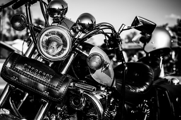 Black and white close-up photo of a motorcycle