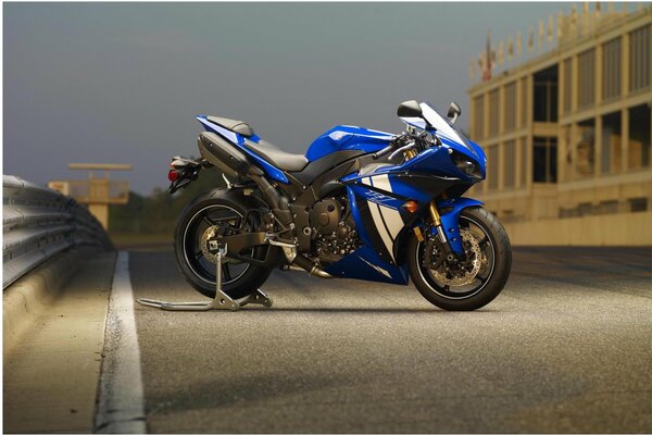 Yamaha blue motorcycle on the road background