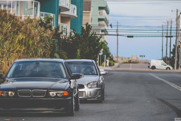 Two cars in an urban environment