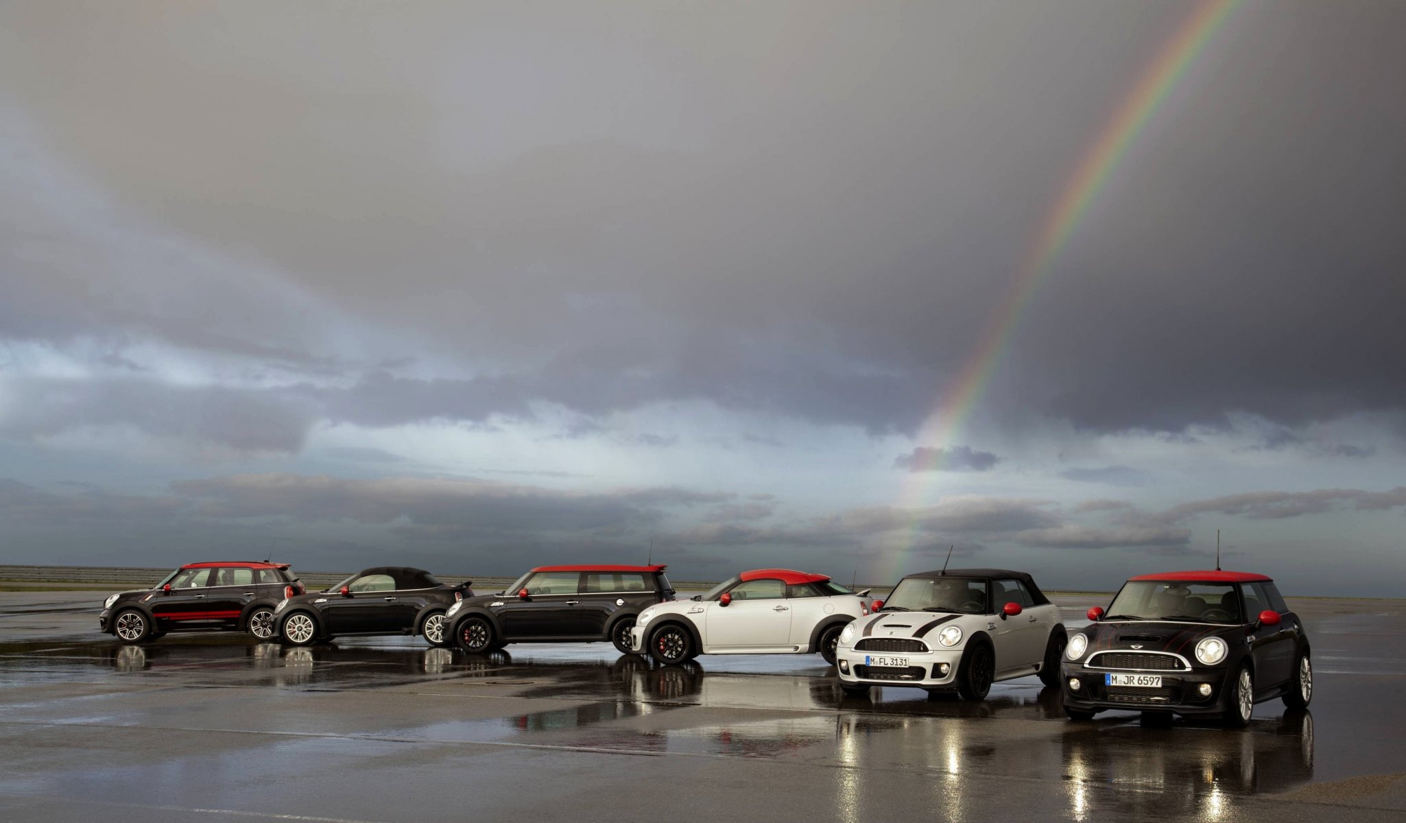 mini cooper mini mini cooper cars a lot asphalt rainbow cloudy