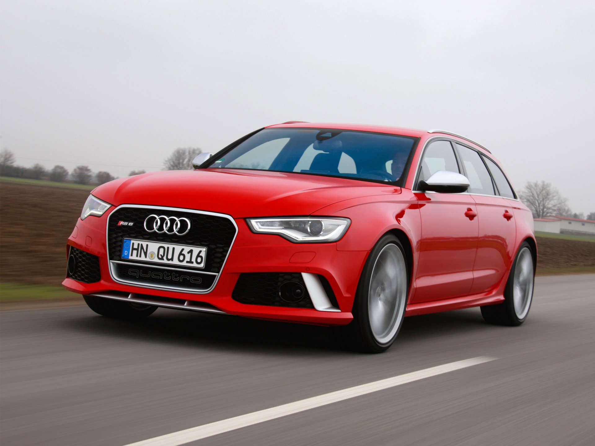 audi rs6 avant red car road speed