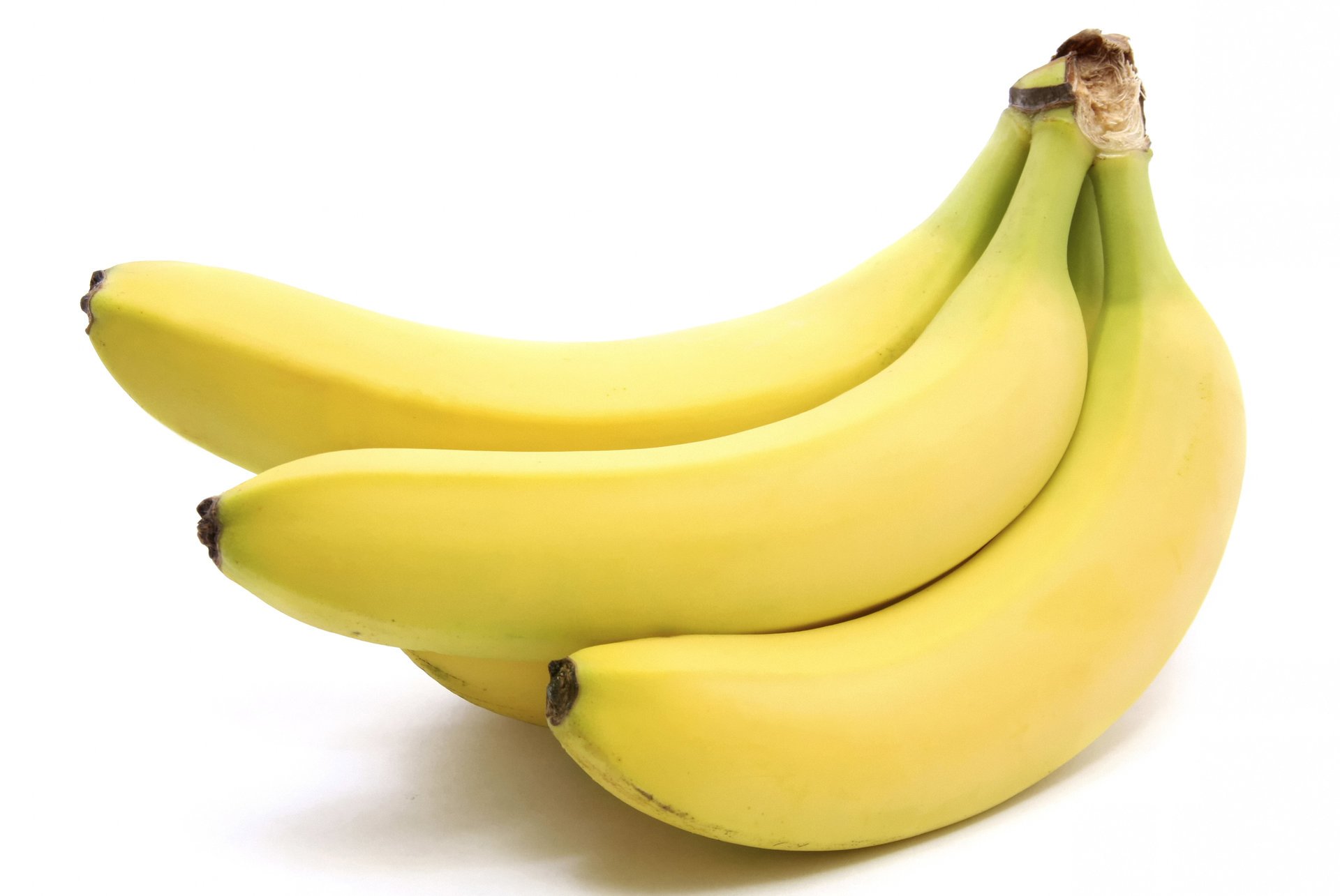 bündel von bananen bananen bananen obst makro weißer hintergrund gelb licht licht früchte