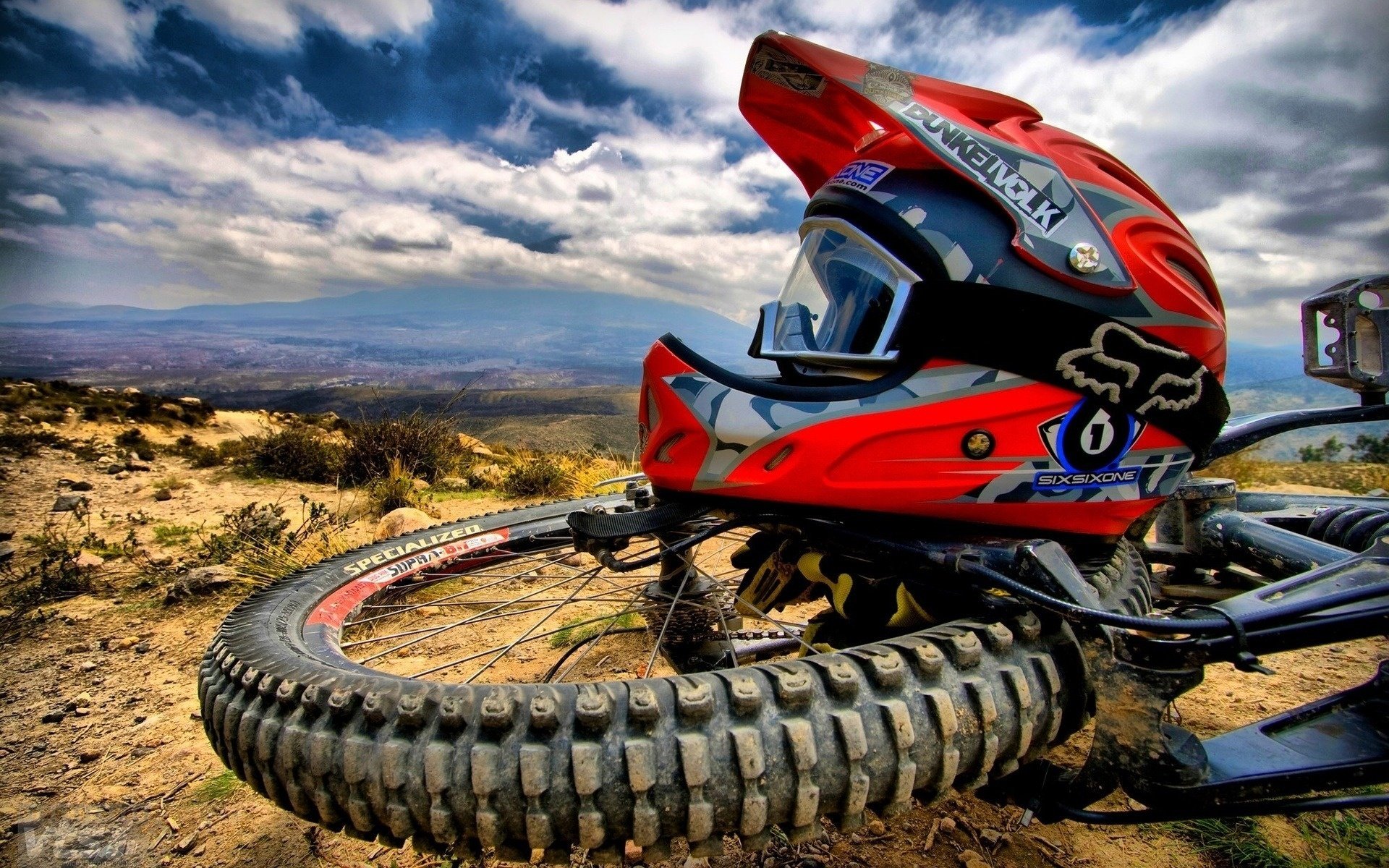 helmet riding the steppe sport mountains the sky wheel motorsport