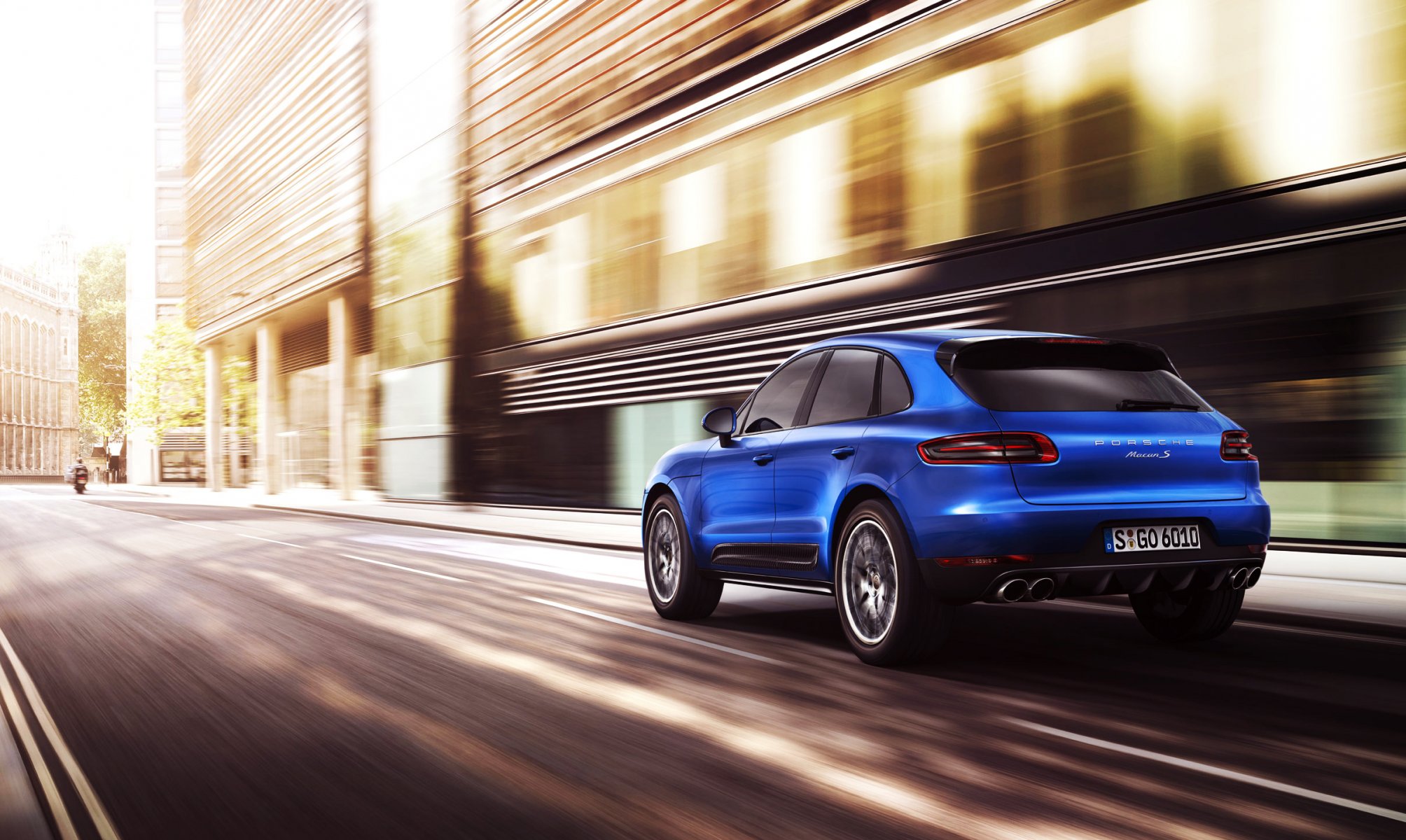 porsche macan suv machine blue car rear view in motion road town