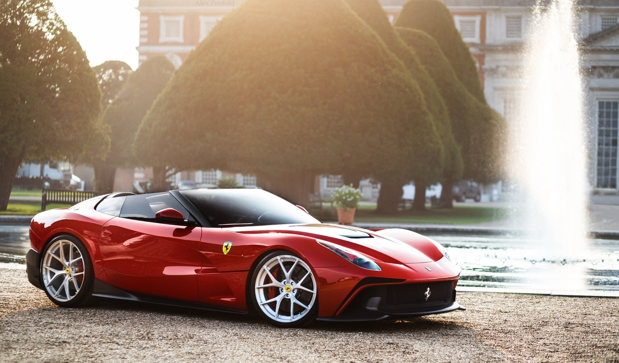 ferrari f12 trs supersportwagen rot brunnen vorne