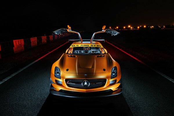 Orange Mercedes-benz car with raised doors