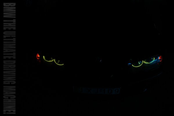 Colored car headlights in the dark