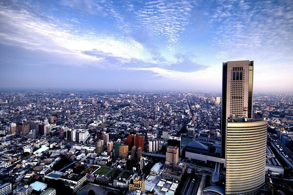 Horizon with sky and clouds over buildings