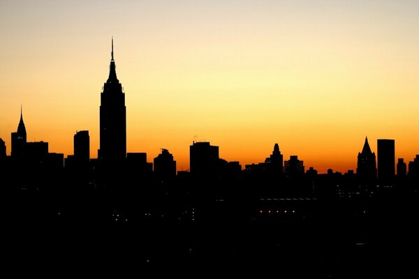 Sunset and lights created a clear outline of the city