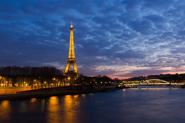 A night in France with lights and a tower