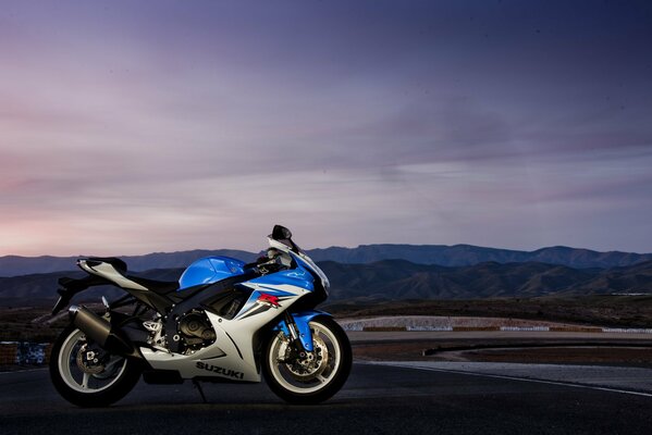 Suzuki motorcycle at dusk on the road