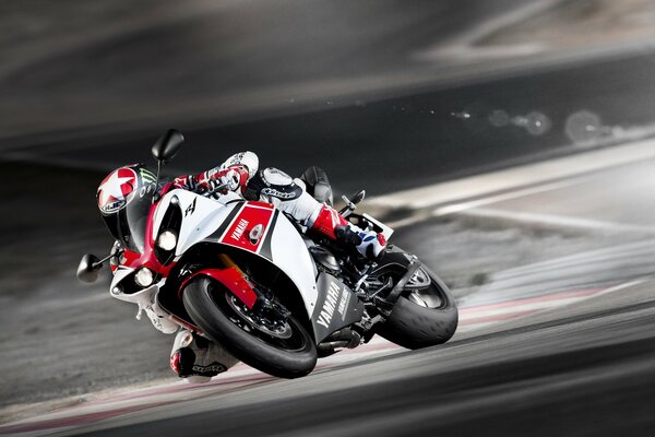 Yamaha motorcycle is flying along the highway at high speed