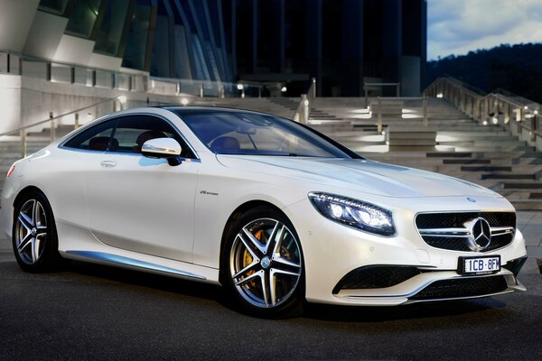 Presentation of Mercedes - white coupe