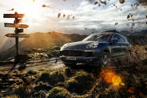 Porsche Cayenne vor dem Hintergrund einer wunderschönen Landschaft