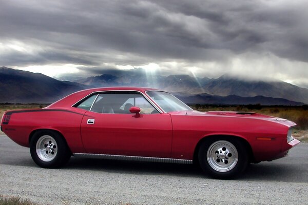 Muscular sports car in red