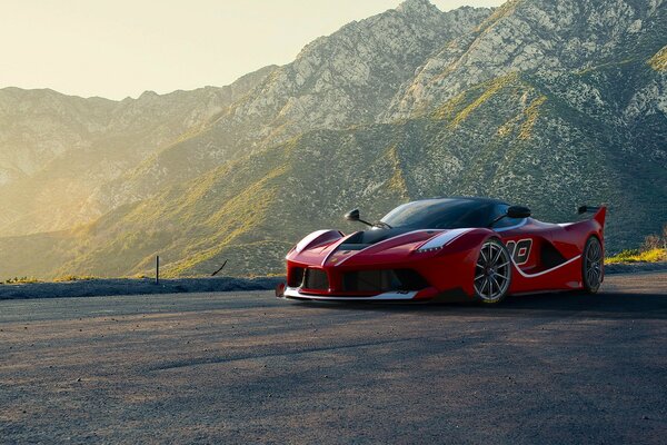 Red Ferrari supercar flaunts at sunset