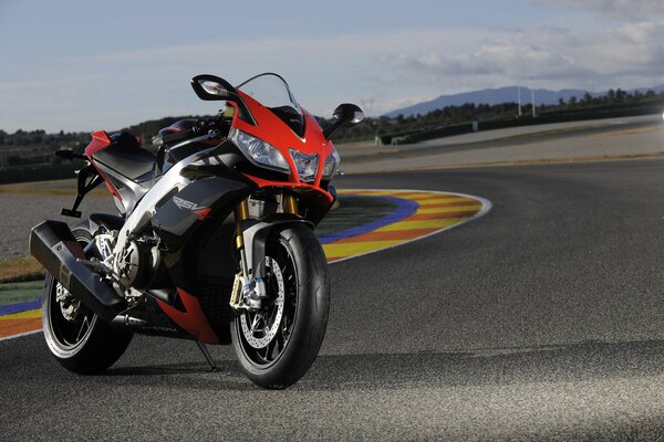 Black with red elements aprilia rsv4 sport bike