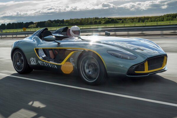 Sport voiture verte sur la vitesse