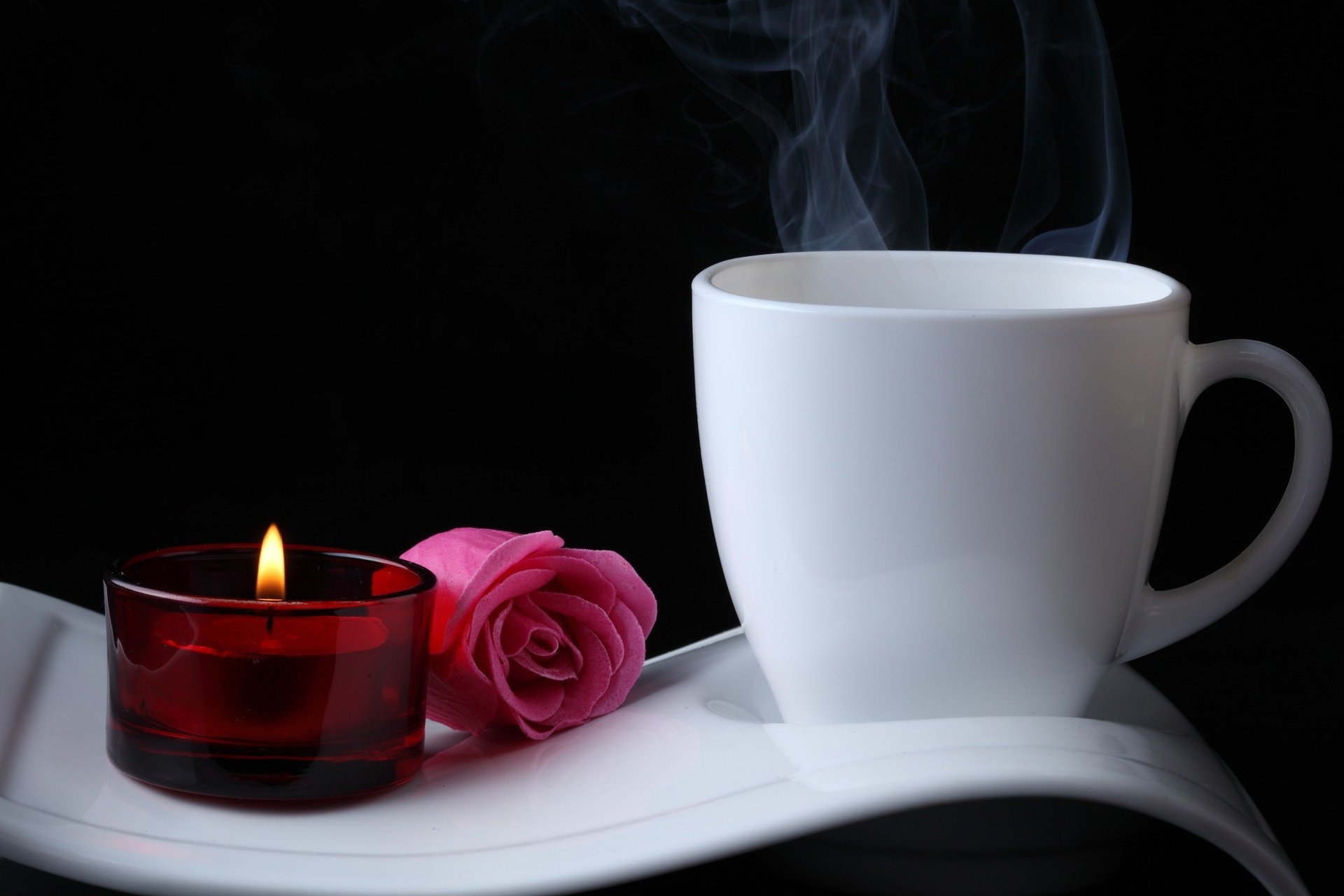 tsyvetok hot coffee coffee rose flowers candle rose cup couple fragrance fire black background dark background stand mug