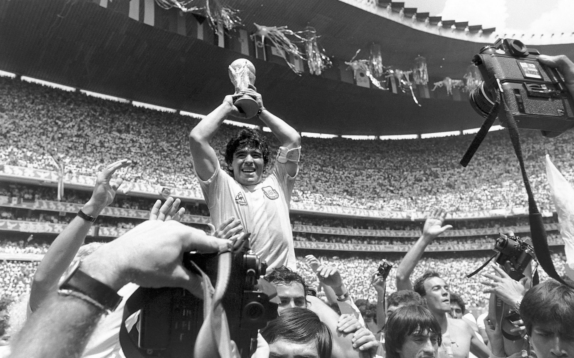 maradona black and white maradona ovation joy football player football b-w cup spectators cameras stadium