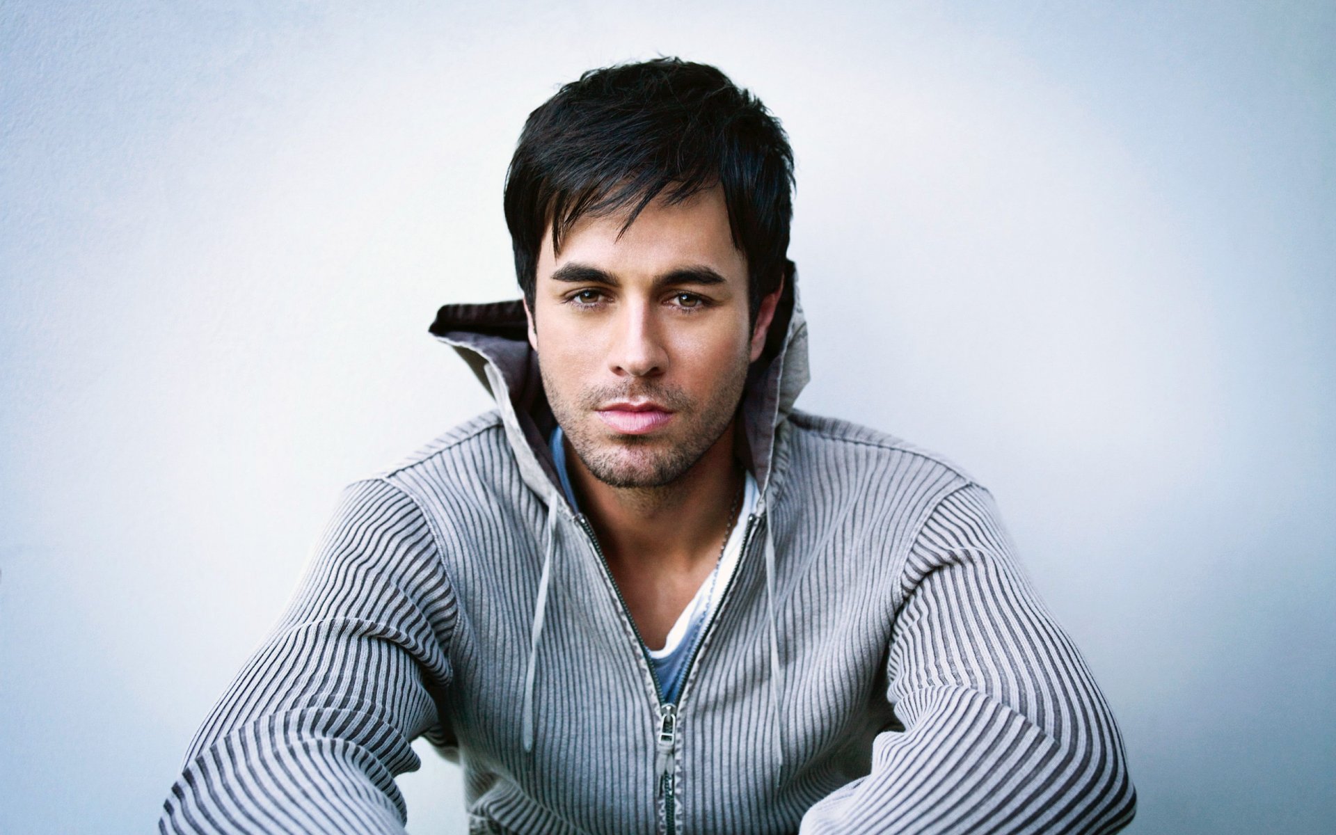 males brown-eyed singer enrique iglesias enrique iglesias performer musician brunette sweater star unshaven men portrait look eyes face