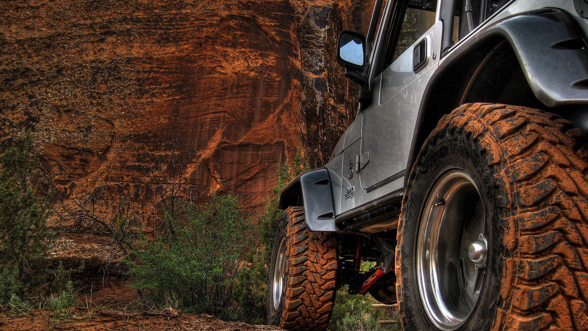 jeep wheel sand mountain rock